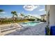 Enjoy this beautiful pool surrounded by palm trees and plenty of space for lounge chairs at 1005 Coyote Creek Way, Reunion, FL 34747