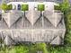 Aerial view of the property featuring a well-maintained roof and landscaping at 10746 Regent Square Dr # 1502, Orlando, FL 32825