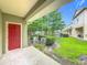An outside view from the back porch featuring lawn area and a view of the lake at 10746 Regent Square Dr # 1502, Orlando, FL 32825