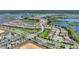 Expansive aerial view showing a community with lakes, landscaping, and nearby recreation, offering a balanced lifestyle at 1101 Downswing Pl, Davenport, FL 33896