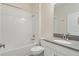 Clean bathroom with a shower-tub combination, vanity, and neutral color scheme at 1101 Downswing Pl, Davenport, FL 33896