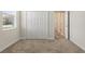 Bedroom with carpet, window, and closet at 1101 Downswing Pl, Davenport, FL 33896