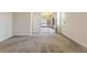 Cozy bedroom featuring plush carpet, a sliding glass door, and lots of natural light at 1101 Downswing Pl, Davenport, FL 33896