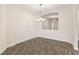 Formal dining room featuring wood-look tile flooring and an elegant chandelier at 1101 Downswing Pl, Davenport, FL 33896