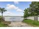 Neighborhood boat ramp with water access and informational sign, near the lake at 1186 Laguna Cir, St Cloud, FL 34771
