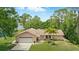 Charming single-story home featuring a well-maintained lawn and attached two car garage at 1186 Laguna Cir, St Cloud, FL 34771