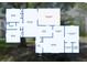 Detailed floor plan layout showing bedrooms, bathrooms, kitchen, and living areas at 1186 Laguna Cir, St Cloud, FL 34771