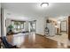 Open concept living room with sliding glass door leading to a patio at 1186 Laguna Cir, St Cloud, FL 34771