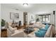 Bright living room featuring modern decor, neutral tones, and elegant furnishings at 1186 Laguna Cir, St Cloud, FL 34771