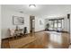 Spacious living room with hardwood floors and a large window offering a scenic view at 1186 Laguna Cir, St Cloud, FL 34771