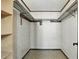 Walk-in closet with carpeted floors, overhead lighting, and shelving at 1186 Laguna Cir, St Cloud, FL 34771