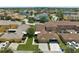 Overhead view of homes with mature landscaping and attached garages in a Gathering-friendly neighborhood at 13636 Beauregard Pl, Orlando, FL 32837