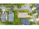An aerial top-down view of a home and its surrounding neighborhood, highlighting the landscape and street layout at 14167 Bradbury Rd, Orlando, FL 32828