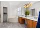 Main bathroom with soaking tub, double vanity, and tile floors at 14167 Bradbury Rd, Orlando, FL 32828