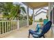 Cozy front porch with seating, perfect for enjoying the outdoors at 14167 Bradbury Rd, Orlando, FL 32828