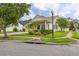 Lovely home with a neatly landscaped front yard, lush green lawn, and inviting entryway at 14167 Bradbury Rd, Orlando, FL 32828