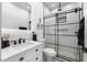Modern bathroom with a marble countertop vanity, stylish shower, and sleek design elements at 14412 Saint Georges Hill Dr, Orlando, FL 32828