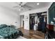 Charming bedroom features a closet and view of backyard at 14412 Saint Georges Hill Dr, Orlando, FL 32828