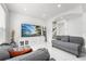 Living room featuring marble floors, recessed lighting, and contemporary furniture at 14412 Saint Georges Hill Dr, Orlando, FL 32828