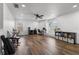 Expansive home office with multiple workstations, natural light, and ample storage at 14412 Saint Georges Hill Dr, Orlando, FL 32828