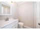 Clean bathroom with white vanity, toilet, and mirror at 1614 Shady Ridge Ct # 252, Orlando, FL 32807