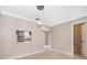 Open-concept dining room with hanging lights, tile flooring, and pass through at 1614 Shady Ridge Ct # 252, Orlando, FL 32807