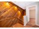 Staircase with wood paneling and lighting at 1614 Shady Ridge Ct # 252, Orlando, FL 32807
