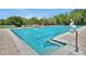 Community pool with wheelchair lift, clear water and marked lanes for fitness and recreation at 168 Club Villas Ln, Kissimmee, FL 34744