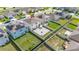 Bird's eye view showcasing the property's backyard, neighboring houses, and well-maintained landscaping at 176 Sofia Ln, Lake Alfred, FL 33850