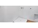 Laundry room featuring hookups and wood-look flooring at 208 Flag Lilly Ln, Umatilla, FL 32784