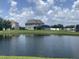 Backyard view of home, pond and community at 2255 Stone Lake Ct, Orlando, FL 32824