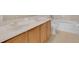 Bathroom featuring a double sink vanity, tile flooring, toilet and bathtub at 2255 Stone Lake Ct, Orlando, FL 32824