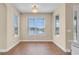 Bright dining area features large windows with relaxing water views at 2255 Stone Lake Ct, Orlando, FL 32824