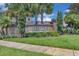 Fieldstone Estates entrance sign featuring mature landscaping, brick walls, and decorative wrought iron fencing at 2255 Stone Lake Ct, Orlando, FL 32824