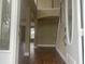 Grand foyer with hardwood floors, arched entryways, and staircase at 2255 Stone Lake Ct, Orlando, FL 32824