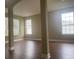 Bright, open living room with hardwood floors and an abundance of natural light at 2255 Stone Lake Ct, Orlando, FL 32824