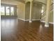 Spacious living room features gleaming floors, abundant natural light, and a view of the open floor plan at 2255 Stone Lake Ct, Orlando, FL 32824
