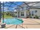 Sparkling pool inside screened lanai with outdoor potted plants and a view of the backyard at 2255 Stone Lake Ct, Orlando, FL 32824