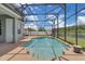 Screened-in pool with a view of the lake at 2255 Stone Lake Ct, Orlando, FL 32824