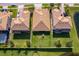 Overhead shot of a lovely home surrounded by lush greenery and manicured lawns in a peaceful neighborhood at 2736 Atherton Dr, Orlando, FL 32824