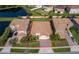Beautiful aerial view of home with spacious backyard, lake view, and mature landscaping at 2736 Atherton Dr, Orlando, FL 32824