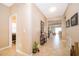 Inviting entryway features tile flooring, neutral paint, and leads to a bright and open living space at 2736 Atherton Dr, Orlando, FL 32824