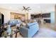 Spacious living room with tile flooring, comfortable seating, and an open layout at 2736 Atherton Dr, Orlando, FL 32824