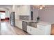 Gorgeous kitchen with stainless steel appliances, granite countertops, a tile backsplash, and abundant cabinet space at 2750 Eagle Lake Dr, Clermont, FL 34711