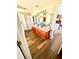 Spacious bathroom vanity with double sinks, wood-look floors, and a large mirror at 3 Sunrise Dr, Ocala, FL 34472