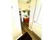 Bathroom view showcasing vanity, modern wood-look flooring, and neutral wall color at 3 Sunrise Dr, Ocala, FL 34472
