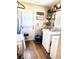 Functional laundry room with washer, dryer, and ample storage at 3 Sunrise Dr, Ocala, FL 34472