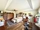 Large primary bedroom with attached exercise equipment and wood-look floors at 3 Sunrise Dr, Ocala, FL 34472