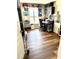 Well-organized office featuring natural light, desk, and wood-look floors at 3 Sunrise Dr, Ocala, FL 34472