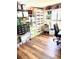 Bright office space with ample storage, wood-look floors, and a large window at 3 Sunrise Dr, Ocala, FL 34472